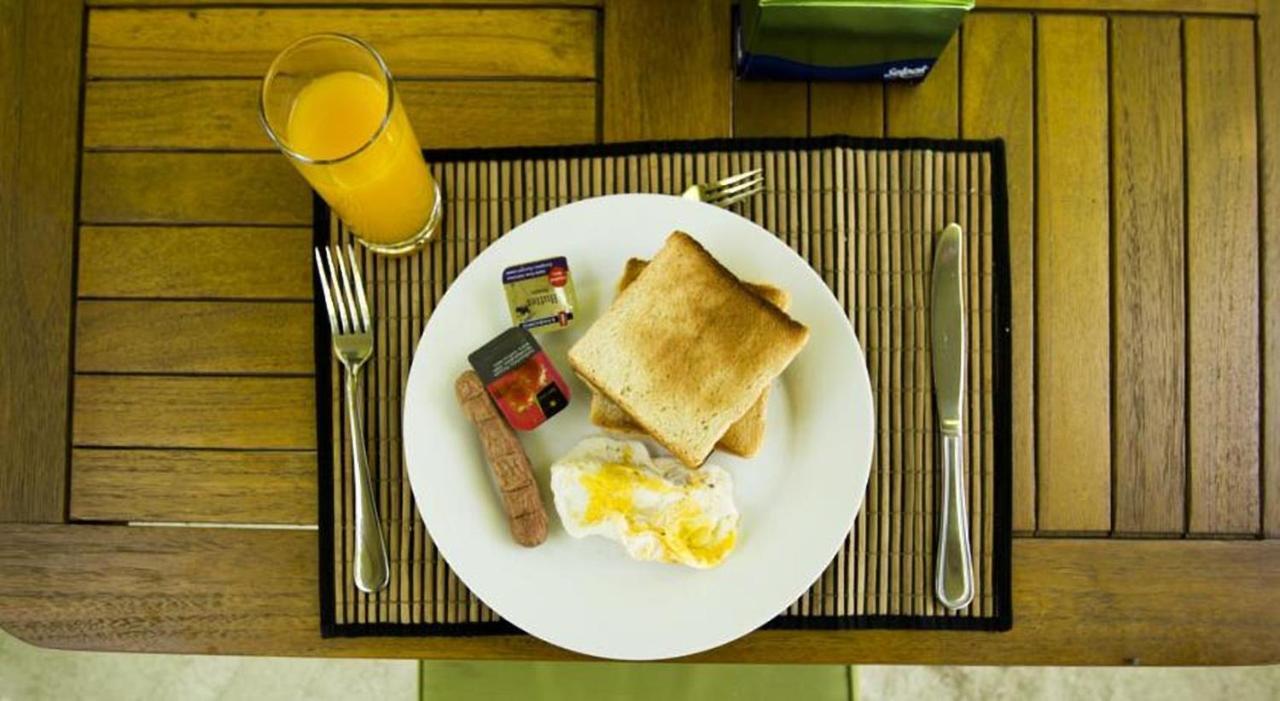 Off Day Inn Мале Екстериор снимка
